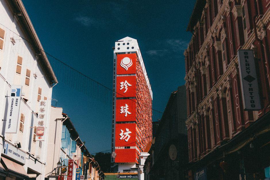 Chinatown Street Scene with Iconic Red Building